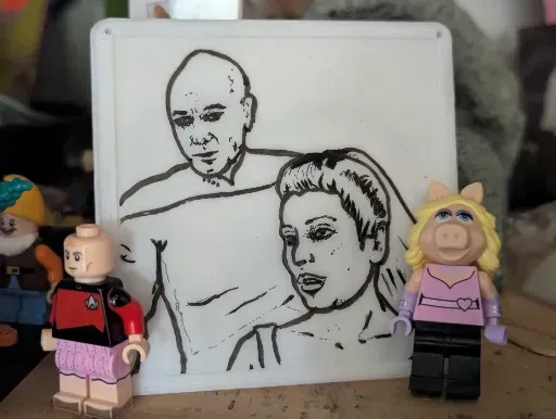 ink drawing of Picard and Deanna